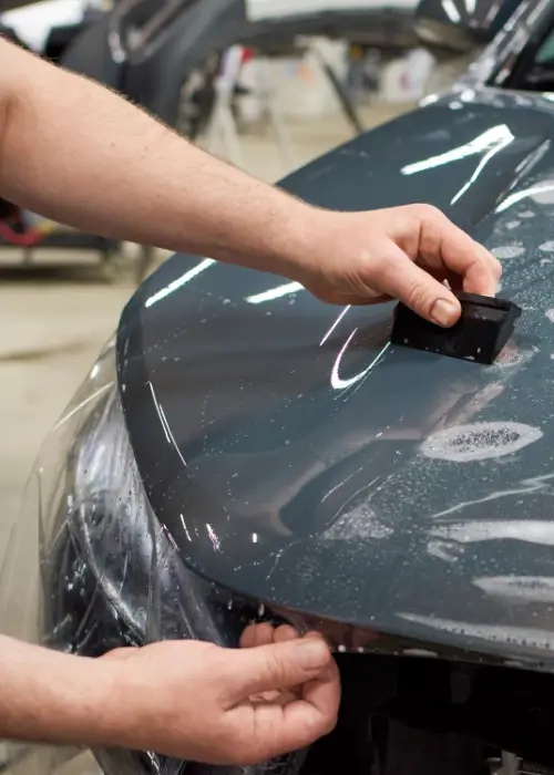 Applying paint protection film to a car